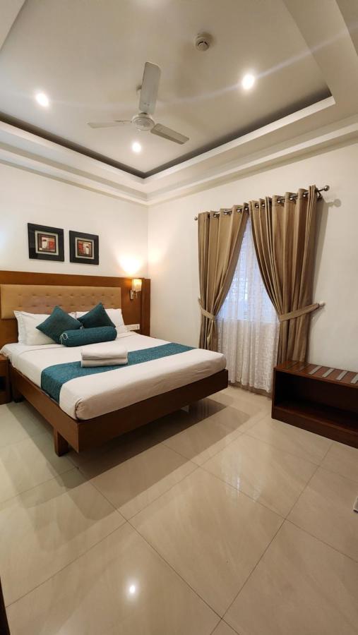 Vishnu Inn Guruvayur Bagian luar foto